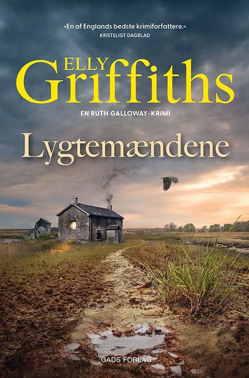 Cover for Elly Griffiths · En Ruth Galloway krimi - bind 12: Lygtemændene, PB (Sewn Spine Book) [2º edição] (2024)
